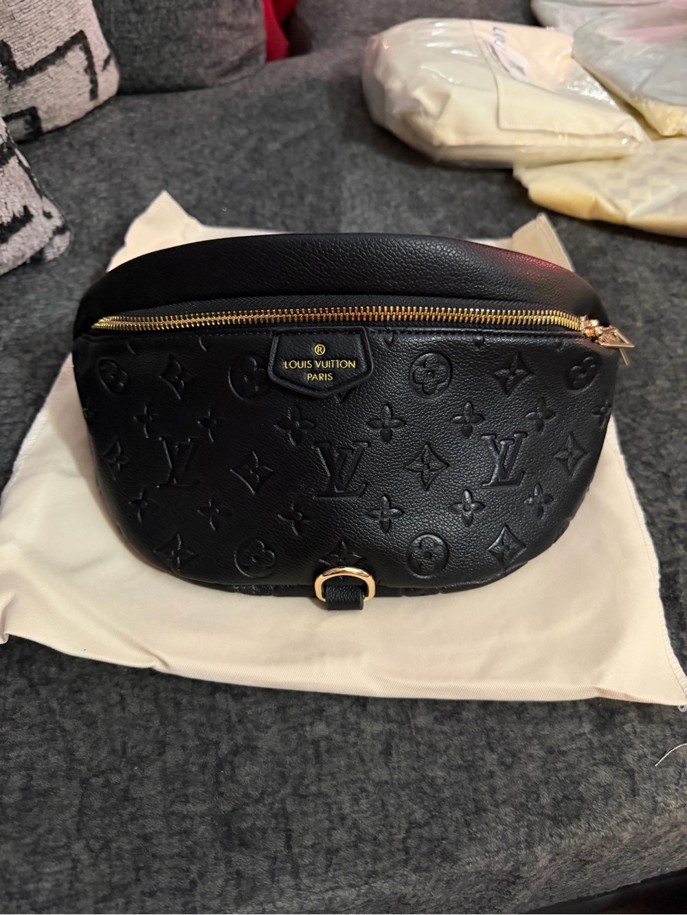 Black bum bag with dust bag